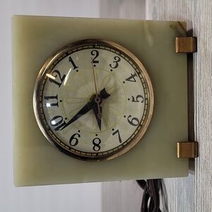 Clock inset in Stone